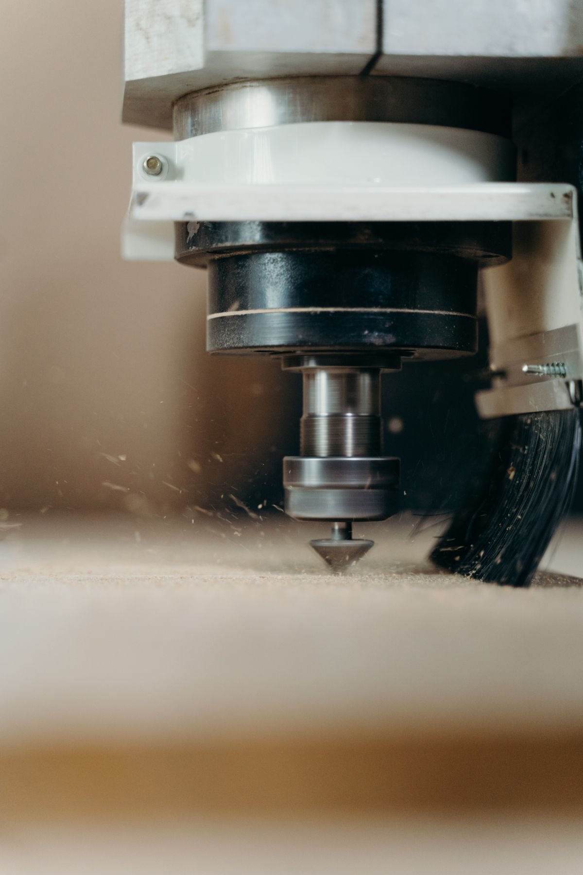 CNC router cutting a wooden board